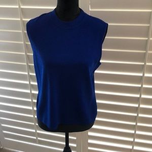 St. John royal blue knit sleeveless top. Zipper.